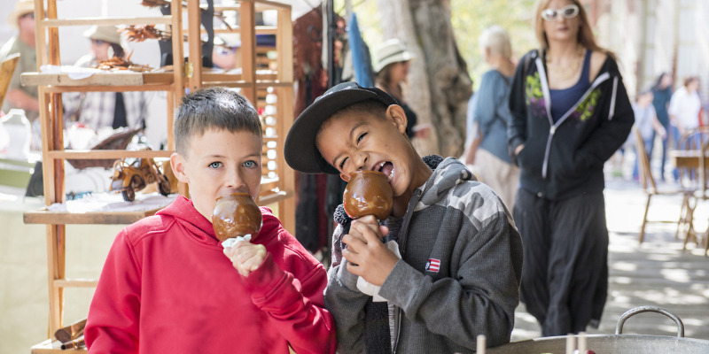 Boys and caramel apples in Columbia